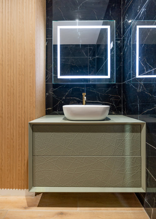Meuble de salle de bain suspendu vert tendre avec vasque à poser et miroir éclairé